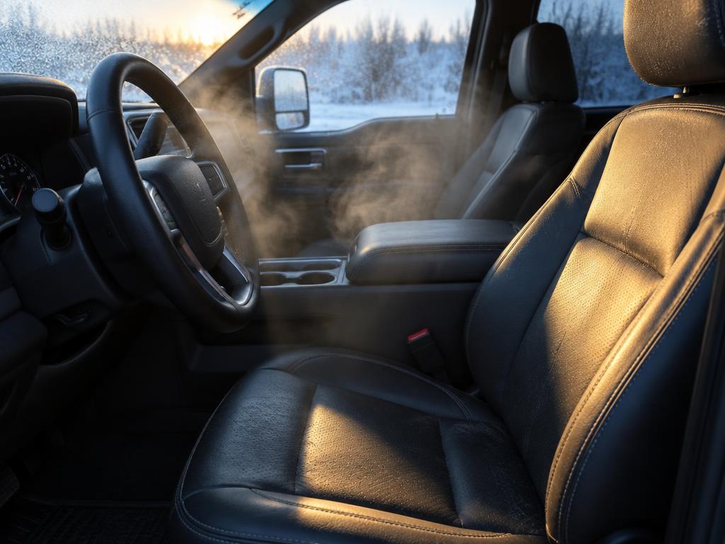 Pickup truck cabin on a cold Iowa morning with a warm driver seat